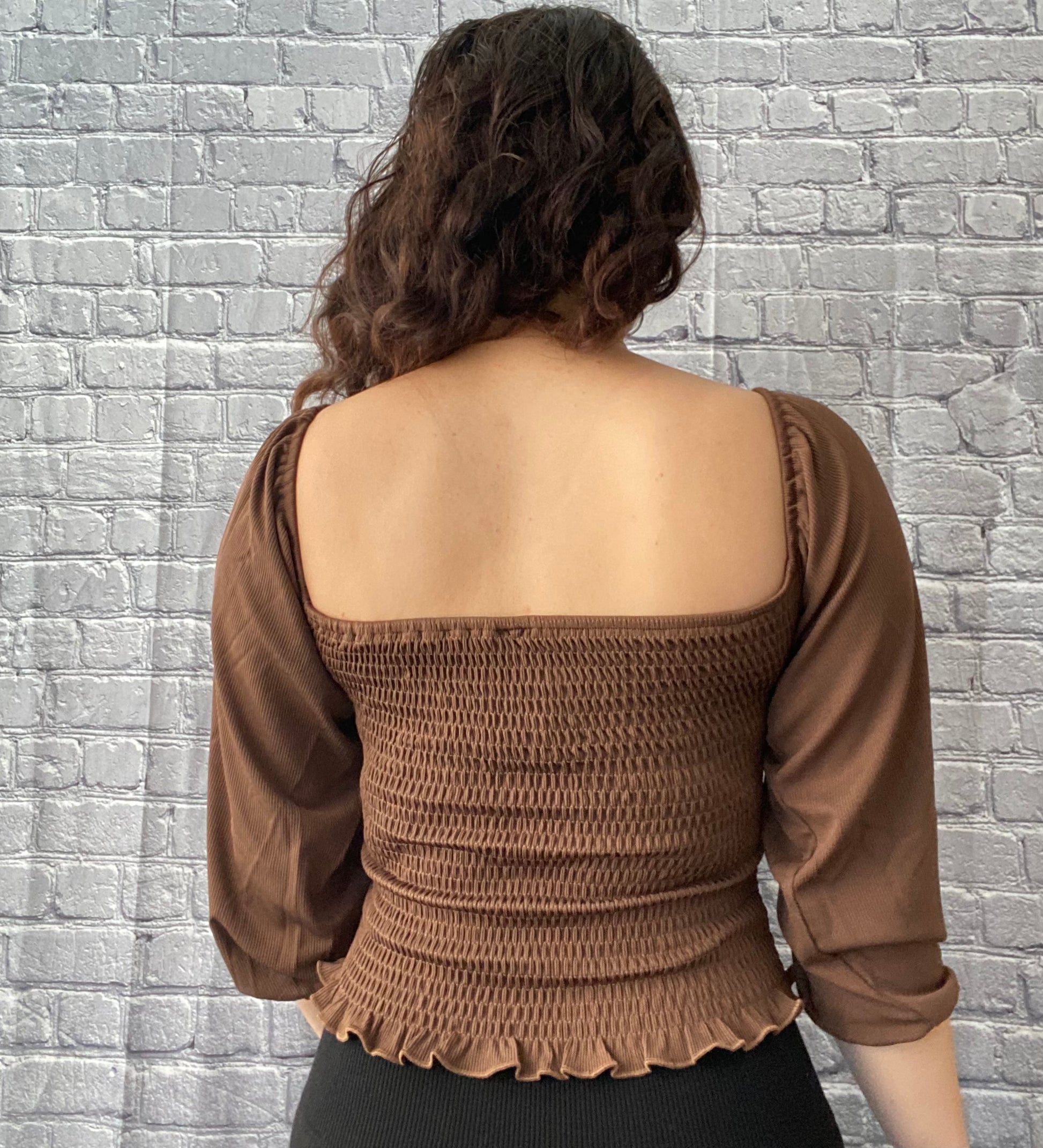  brown ballon sleeve blouse with ruched detail on torso