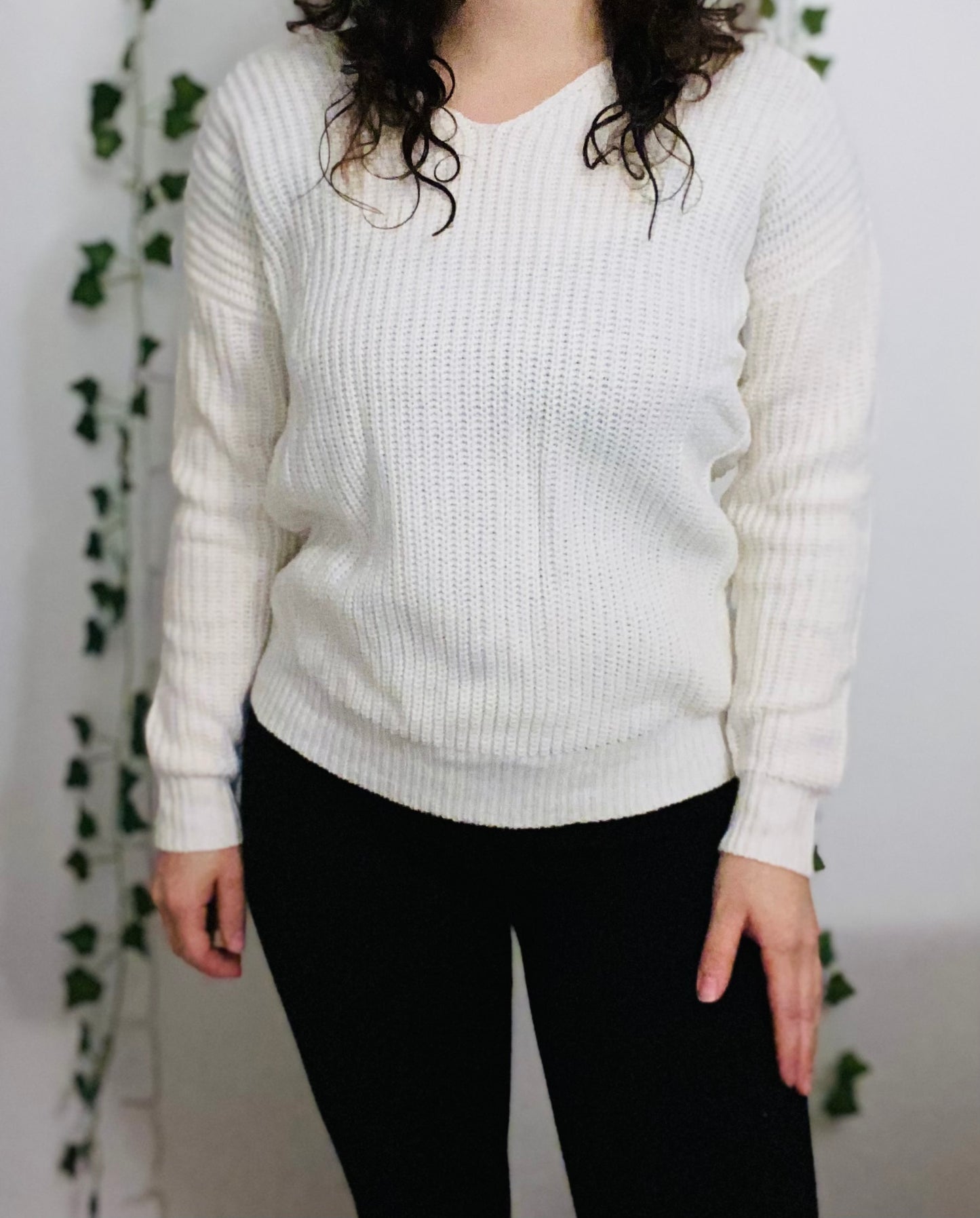 ivory acrylic sweater with twist knot in back 