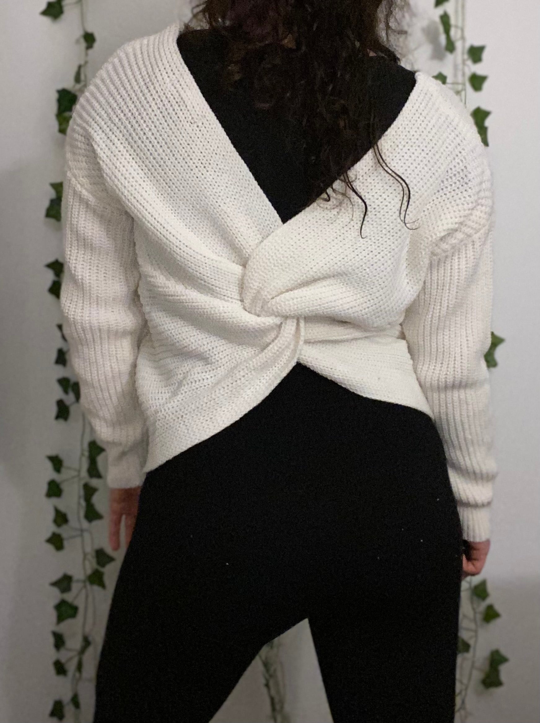 ivory acrylic sweater with twist knot in back 